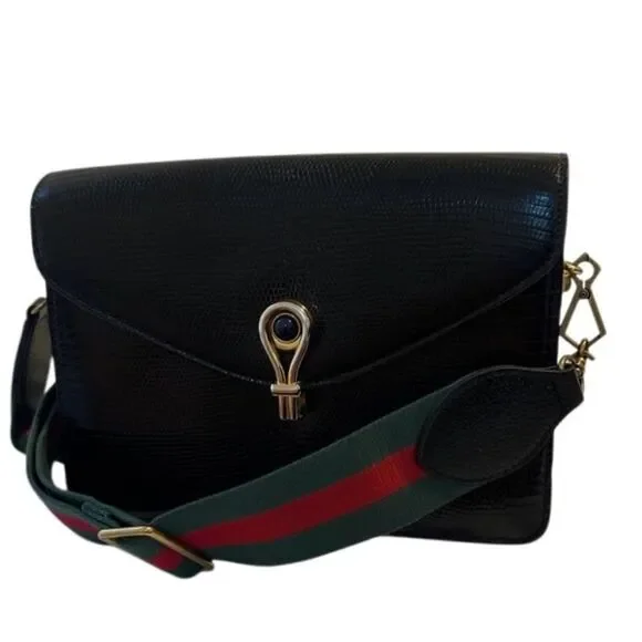Gucci Black and Gold Leather Clutch